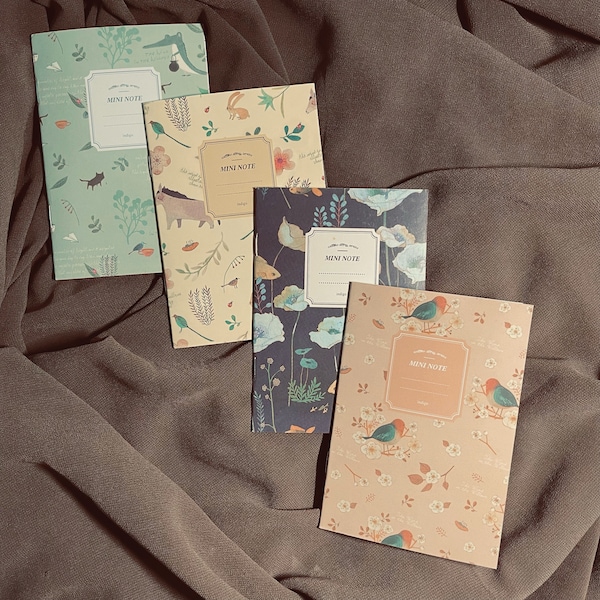 Vintage themed mini notebooks with lined pages