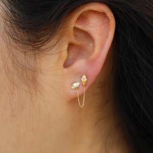 14k solid gold evil eye and chained hamsa earring