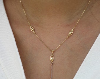 14k solid gold oblong bead tassel necklace