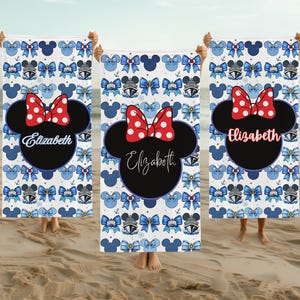 Personalized Disney cruise ship beach towel featuring a blue and red Minnie Mouse inspired design, customized with a child’s name. Soft plush fabric makes it perfect for pool days, beach adventures, and family cruise vacation memories.