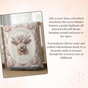 May include: Woven blanket featuring a highland calf with floral accents and the name "Savannah" in an oval frame. The blanket has a floral border and fringe.