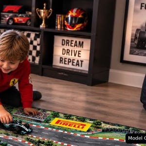 Kid Grand Prix Activity Carpet featuring a Race Car Road Rug Formula 1 Track Play Mat design for children who love racing, perfect for a bedroom, playroom or nursery and encouraging Imaginative Play with Red Bull Mercedes Ferrari inspired toy cars. image created with AI.