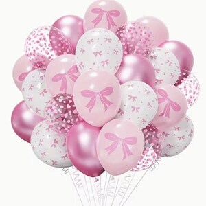 May include: A collection of pink and white balloons. Some are plain pink, others are white with small pink bows, and some are clear with pink confetti. Several balloons feature a large pink bow design.