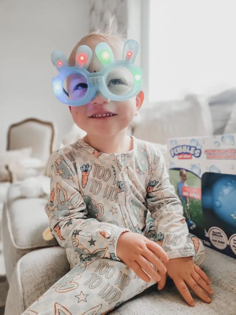 Cozy Baby Boy Easter Bunny Sleepers for newborns and toddlers, featuring sweet bunny details. These Soft Infant Spring Pajamas for Newborns Toddlers and Holiday Photos are ideal Cute Bunny Outfit Ideas for Easter parties and family photo sessions.