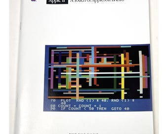 May include: A white manual titled "Apple II A Touch of Applesoft BASIC" with the Apple logo. The cover features a colorful geometric design and lines of code. The text "Apple II" is in a black rectangle.