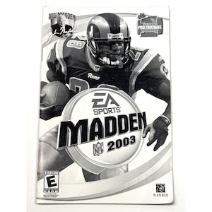 May include: A black and white image of a football player wearing a Rams jersey and helmet. The image is for the video game EA Sports Madden NFL 2003.