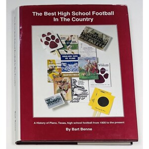 May include: A hardcover book titled "The Best High School Football In The Country" with a maroon cover. The cover features various images of football memorabilia, including team logos and game day programs. The book's subtitle reads "A History of Plano, Texas, high school football from 1900 to the present."