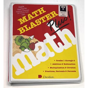 May include: A Math Blaster Plus! educational software package for Apple II computers. The cover features a green robot illustration and the words "Math Blaster Plus!" in yellow and white against a red and yellow background. Includes grades 1-6.