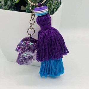 Handmade holographic sparkle resin skull keychain with matching double layer tassel