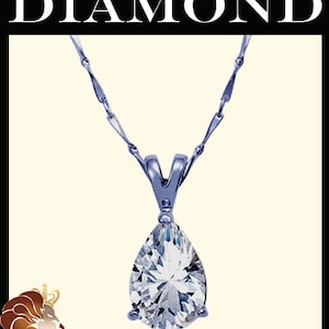 May include: A silver chain necklace with a pear-shaped simulated diamond pendant.