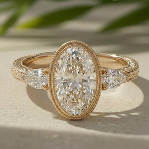 Oval Diamond Ring Lab-Grown Three-Stone Engagement 14K Yellow Gold Bezel With Pear Accents