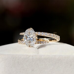 Custom Oval Diamond Engagement Ring: Compass Prongs, Bypass Shank, IGI Certified