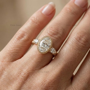 Oval Diamond Ring Lab-Grown Three-Stone Engagement 14K Yellow Gold Bezel With Pear Accents