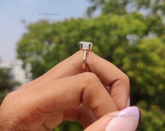 Emerald Cut Diamond Three Stone Gold Engagement Ring: CT Bezel Set