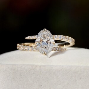 Custom Oval Diamond Engagement Ring: Compass Prongs, Bypass Shank, IGI Certified