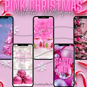 May include: Five pink Christmas phone wallpapers with different designs. The first wallpaper features a pink Christmas tree with white lights and the text "Tis the Season". The second wallpaper features a pink background with the text "All I Want for Christmas is You". The third wallpaper features a pink background with the text "It's the most wonderful time of the year". The fourth wallpaper features a pink background with the text "Santa Baby". The fifth wallpaper features a pink Christmas tree with ornaments and the text "Deck the Halls".
