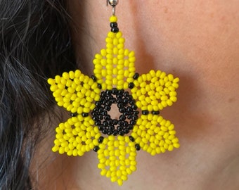 Yellow beaded handmade earrings by Shipibo Conibo tribe of peruvian Amazon