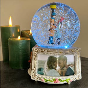 Globo de nieve personalizado con música, luces LED y nieve automática de gran tamaño.