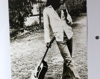 Bob Marley Leaning on Guitar Poster