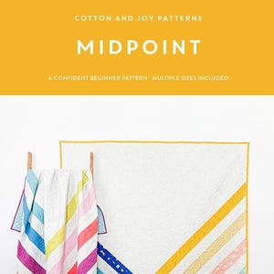 May include: A white quilt with colorful diagonal stripes and a matching quilt hanging on a wooden ladder. The image also features a larger quilt with yellow, pink, and blue stripes. Text on the top reads "Cotton and Joy Patterns" and "Midpoint".