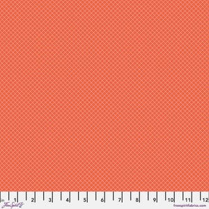 May include: Close-up of a fabric with a repeating grid pattern in a coral color. The grid lines are thin and white. The fabric has a ruler along the bottom edge with the text "Free Spirit" and "freespiritfabrics.com".