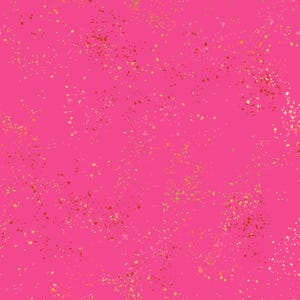 May include: A vibrant pink fabric with a speckled pattern. The design features a scattering of small, irregular dots in shades of gold, red, and white, creating a textured, artistic effect. The overall aesthetic is playful and modern.