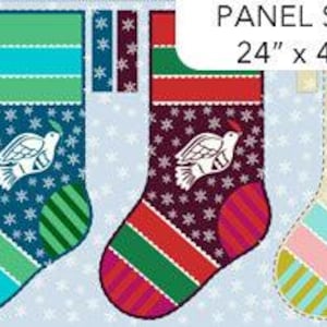 May include: A fabric panel measuring 24 inches by 43 inches featuring three Christmas stockings with dove and snowflake patterns. The stockings are blue, dark red, and beige with striped cuffs and heels. Includes printed instructions for assembly.
