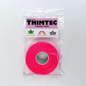 May include: A roll of bright pink thimble tape in a clear plastic bag. The tape is designed to protect fingers from punctures and is colorful and comfortable to wear. The packaging features the brand name "THIMTEC" and the slogan "THIMBLE TAPE".