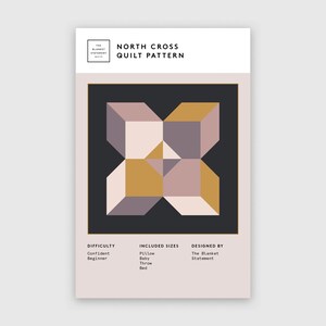 May include: A quilt pattern called "North Cross" with a geometric design featuring overlapping squares in shades of pink, gold, and gray on a black background. The pattern is available in sizes from pillow to bed.