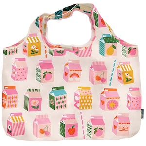 May include: A pink and white reusable shopping tote bag with a colorful pattern of milk cartons with cherries, peaches, and strawberries. The text on the bag reads 