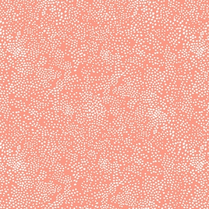 May include: A seamless pattern featuring a coral background densely covered with small, irregular white dots. The design creates a textured, speckled appearance, suitable for various applications like fabric or wallpaper.