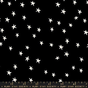 May include: Black fabric with a white star pattern. The stars are hand-drawn and vary in size and shape.