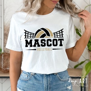 May include: White t-shirt with a black and gold volleyball graphic. The graphic features a volleyball with a net behind it. The text "MASCOT VOLLEYBALL" is below the graphic.