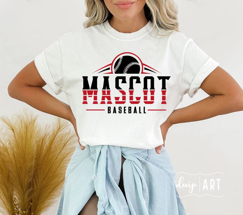 May include: White t-shirt with a red and black baseball graphic and the text "MASCOT BASEBALL".