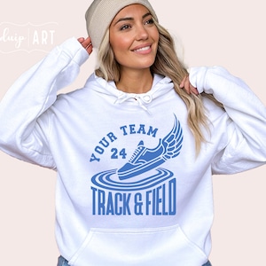 May include: White hoodie with a blue graphic of a running shoe with wings and the text "Your Team 24 Track & Field".