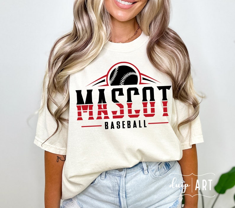 May include: A white t-shirt with a red and black baseball graphic. The graphic says "MASCOT BASEBALL".