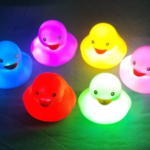 12 Rubber Ducks with LED Light great gift for any occasion or just for fun..