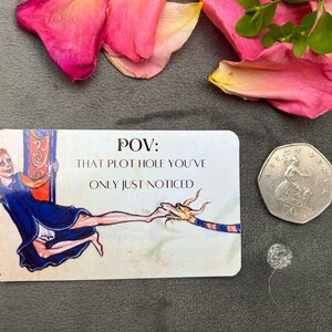 May include: A white card with a medieval-style illustration of a person being pulled by a dragon. The text on the card reads "POV: THAT PLOT HOLE YOU'VE ONLY JUST NOTICED".