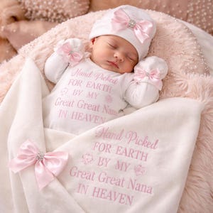 Handpicked for earth Heaven  NEWBORN a FULL SET is a  Romper hat mitts. Personalised add a white cotton blanket or keepsake suitcase