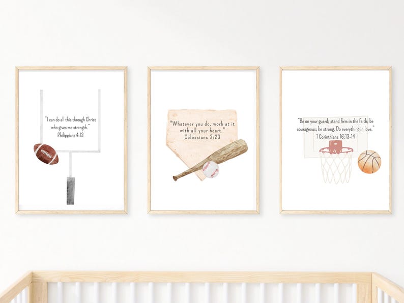 May include: Three framed prints with watercolour illustrations of sports equipment and Bible verses. The prints feature a football and goalpost, a baseball bat and ball, and a basketball and hoop. The text includes Philippians 4:13, Colossians 3:23, and 1 Corinthians 16:13-14.