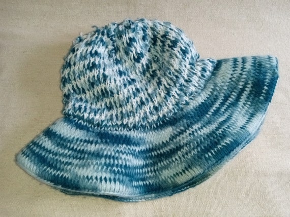 Wide brim whimsical blue hat A Whimsical Blue Wizard S Hat With Tall Pointed Top And Wide  main image 2