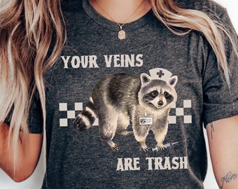 Your Veins Are Trash T-Shirt Funny Raccoon Nurse Graphic Tee Goblincore Nurse TShirt Funny Emergency RN Shirts Raccoon Lover Graphic Tees