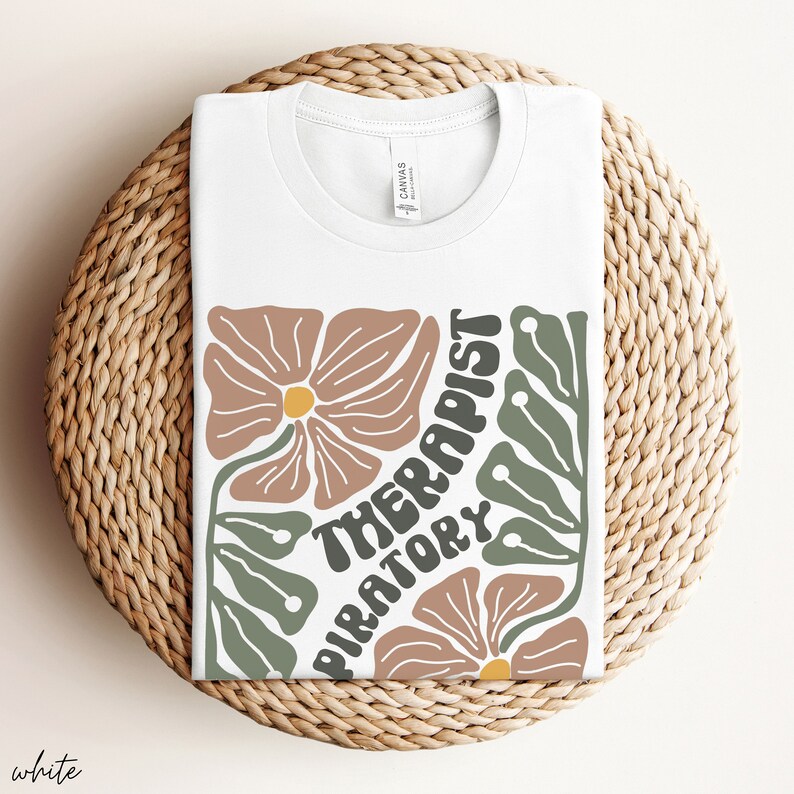 May include: White t-shirt with a floral design and the text "Respiratory Therapist" in a retro font.