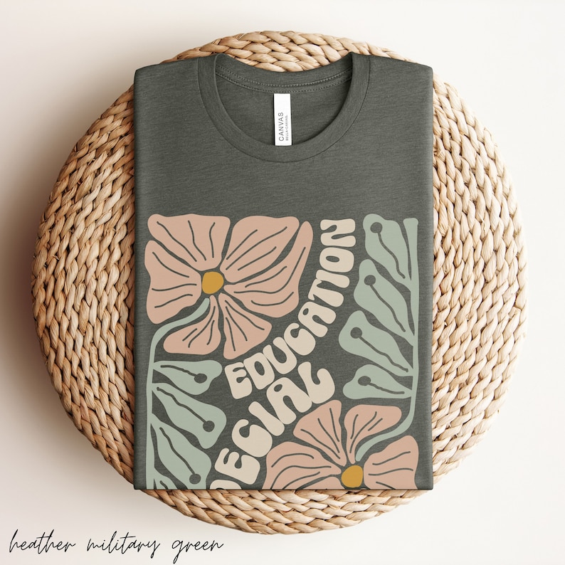May include: A heather military green t-shirt featuring a floral design and the text "Special Education" in a retro font.