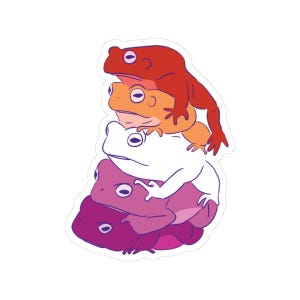 Peut inclure: Un autocollant représentant cinq grenouilles de dessin animé empilées, aux couleurs rouge, orange, blanc, rose et violet. Les grenouilles sont disposées dans un design ludique et empilé.