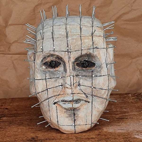 Pinhead/Hellraiser carved figure