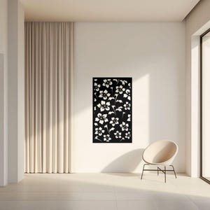 May include: A rectangular black wall panel featuring a laser-cut floral pattern with white negative space. The design consists of various sizes of five-petaled flowers and leafy stems arranged in a dense, repeating botanical composition.