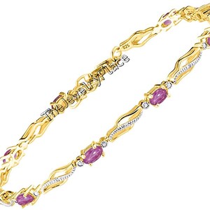 May include: A gold bracelet featuring pink and white gemstones. The bracelet has a delicate, wavy design and is marked "925" and "The Jewelry Place".