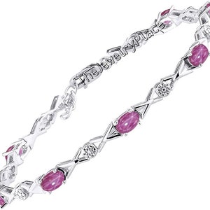 May include: A silver bracelet with oval pink gemstones and small, round, clear gemstones. The bracelet has a geometric design. The clasp has the text "thejewelryplace".