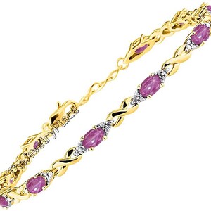 May include: A gold bracelet with a twisted design features pink oval-shaped gemstones and small clear diamonds. The bracelet has a lobster claw clasp.